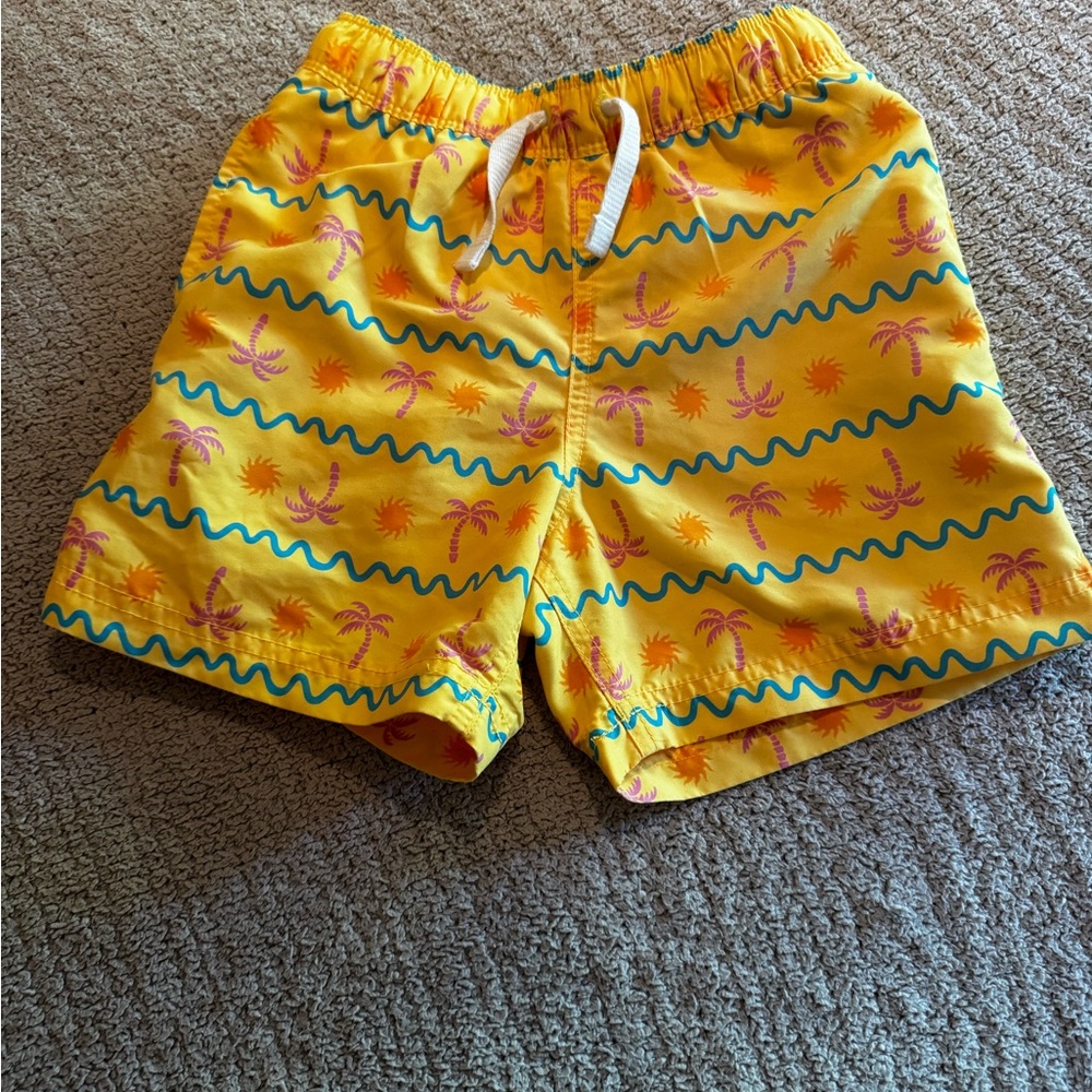 Little boy's Hanna Andersson Yellow Swim Shorts with Palm Print